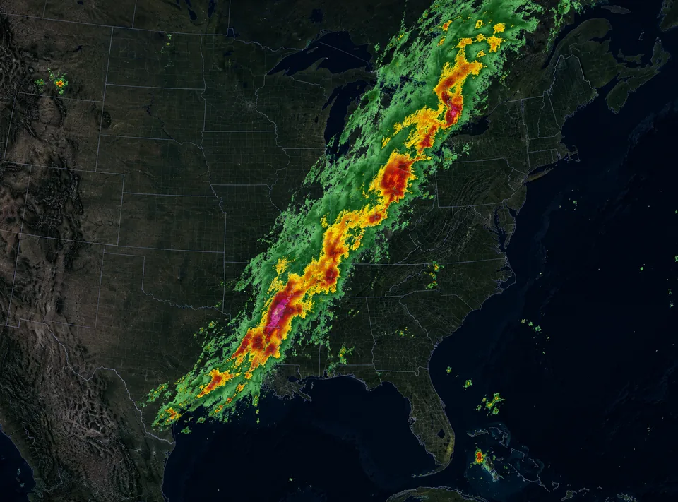 Illustration of radar returns over a dark map — a squall line of green, amber, and red precipitation crossing the eastern US